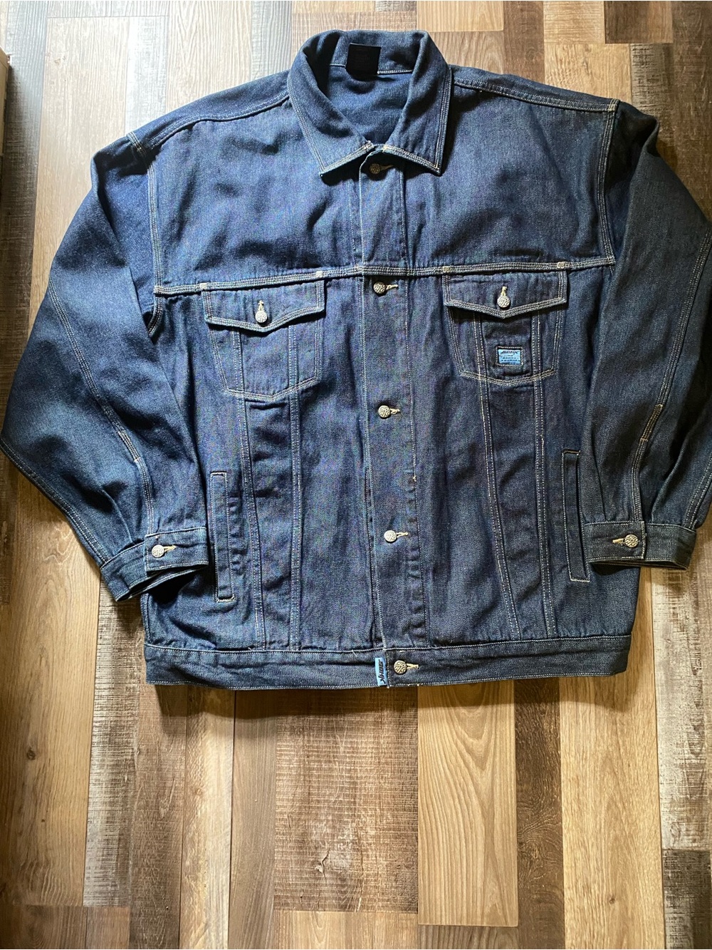 Vintage 1990s School of Hard Knocks denim jacket.